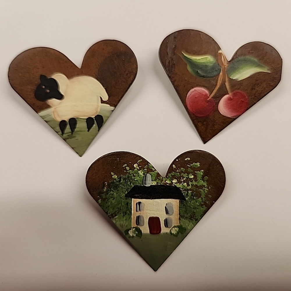 Primitive Folk Art Heart Shaped Brooches With Images of a Lamb, Cherry, & Cottag
